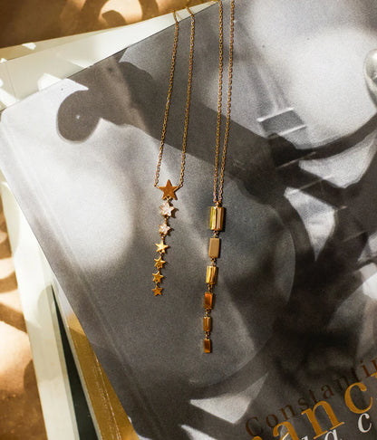 Collier Akiva ZAG étoiles pendantes acier inoxydable doré bijou femme Divinity Sète