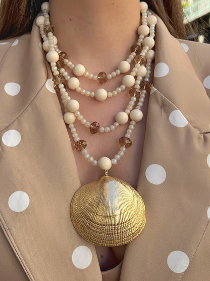 Collier statement coquillage doré Francine Bramli Paris