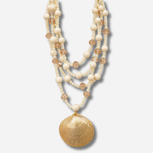 Collier été coquillage doré perles nacrées femme porté