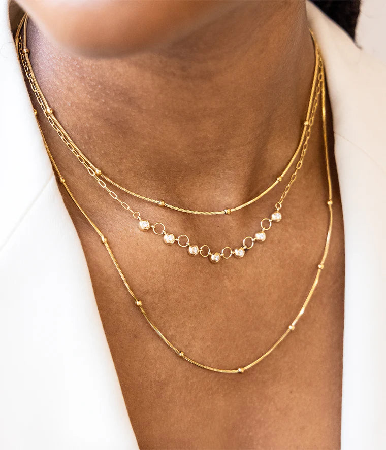 Collier Felice ZAG zircon acier doré anneaux bijou femme Divinity Sète