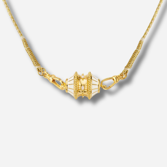 Collier talisman ivoire et doré Mya Bay