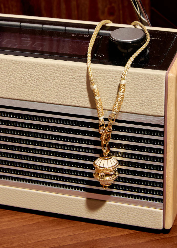 Collier talisman ivoire et doré Mya Bay