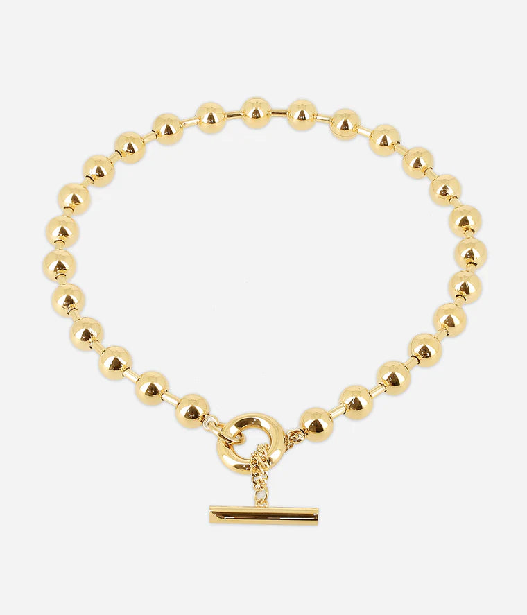 Collier Numa Zag perles dorées fermoir toggle barre