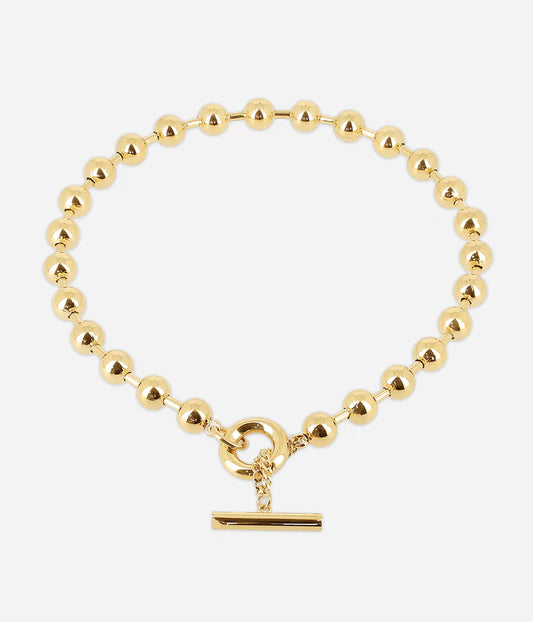 Collier Numa Zag perles dorées fermoir toggle barre