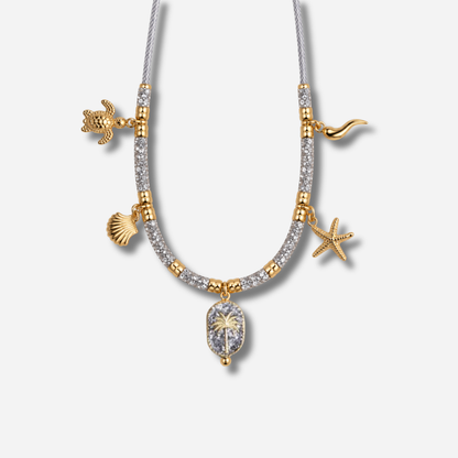Collier Palombaggia Palmier Argent Amadrina en acier doré 18K avec cristaux argentés, palmier central et pampilles marines