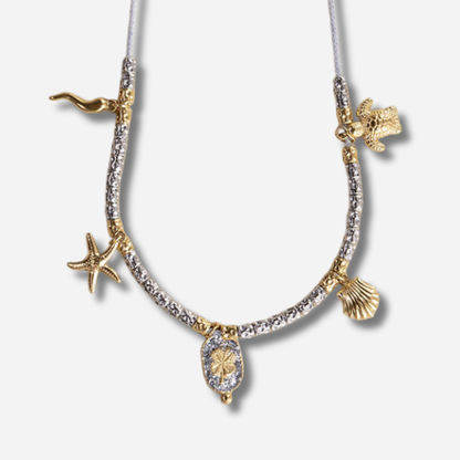 Collier Palombaggia Trèfle Argent Amadrina en acier doré 18K avec cristaux argentés, trèfle porte-bonheur et pampilles marines