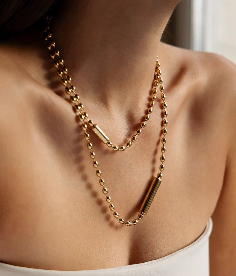 Collier Partinello ZAG acier doré perles chaîne longue cylindres bijou femme tendance Divinity Sète