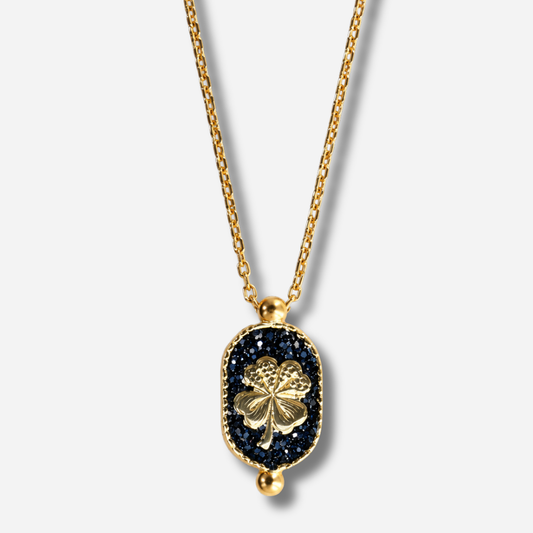 Collier Santa Giulia Trèfle Noir Amadrina Corse avec trèfle doré et médaillon en paillettes noires
