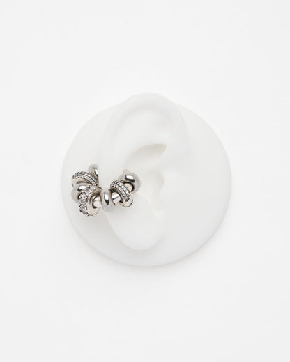 Ear cuff Stella Sigal argent avec anneaux lisses et oxydes de zirconium, bijou d'oreille sans piercing élégant.