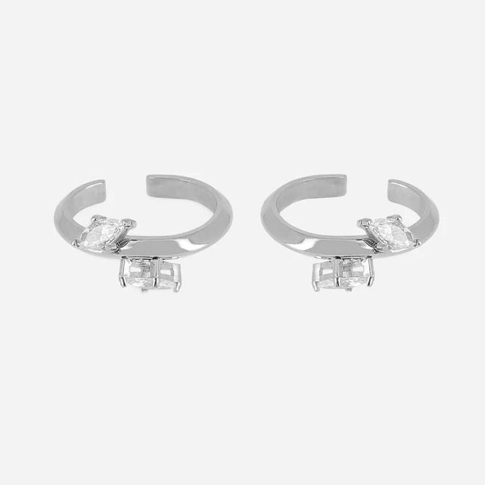 Ear Cuffs Aleria ZAG vendus par paire en acier inoxydable doré ou argenté avec zirconiums