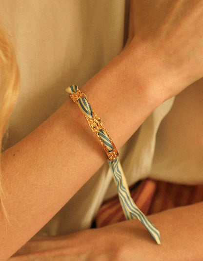 Manchette feerie doree bracelet foulard ajoure floral bijou femme