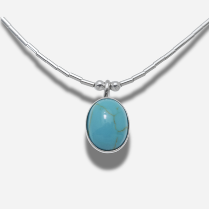 Collier N331 Ovale Turquoise Harpo en argent massif avec pendentif ovale serti d’une turquoise naturelle bleu ciel fabriqué artisanalement aux États-Unis.