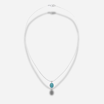 Collier N331 Ovale Turquoise Harpo en argent massif avec pendentif ovale serti d’une turquoise naturelle bleu ciel fabriqué artisanalement aux États-Unis.