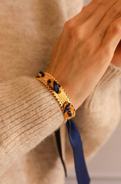 Ruban Annee motif leopard bleu et jaune bijou manchette