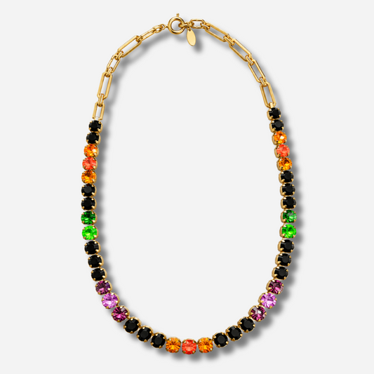 Sautoir Ava Fluo Crézus en cristaux Swarovski noirs, orange, roses, violets et verts fluo, avec sertissage doré et chaîne à maillons – Divinity Sète
