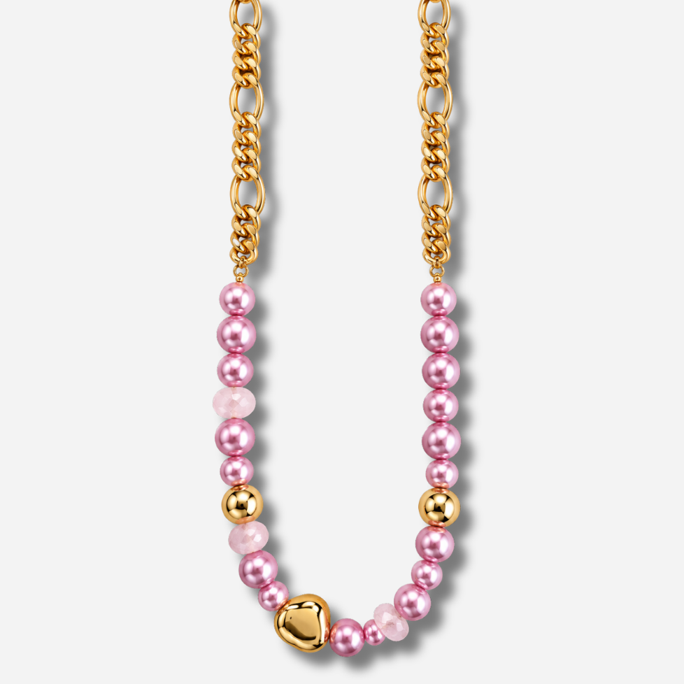 Sautoir Mariella Rose Francine Bramli Paris, long collier composé de perles roses nacrées, de perles rose pâle facettées et d'une chaîne dorée à maillons.

